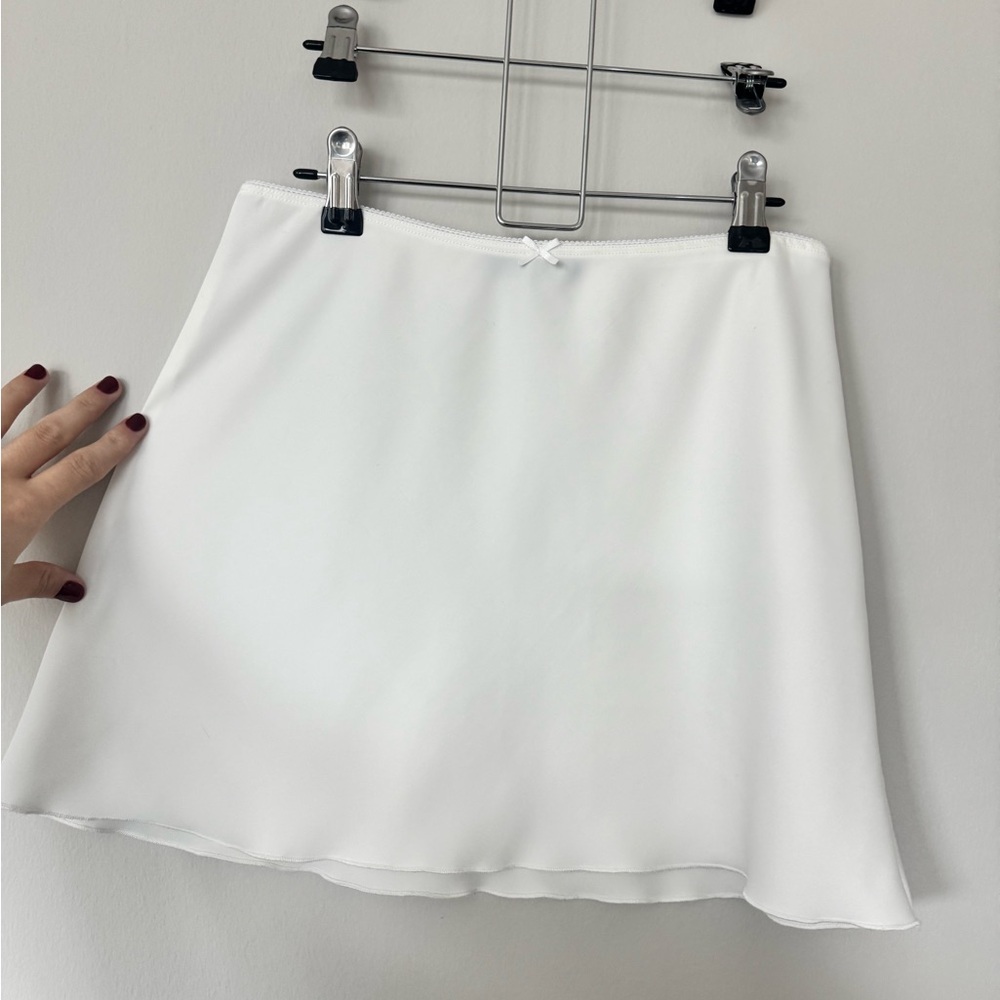 Brandy Melville slip mini skirt
One size white